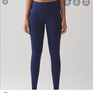 Ivivva girls rhythmic tight navy blue leggings.